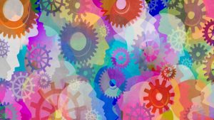 colorful silhouettes of profiles and gears
