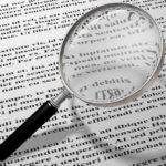 magnifying glass over contract