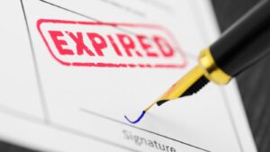Seal expired stamped on a document and fountain pen