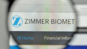 Zimmer Biomet Logo with magnifying glass