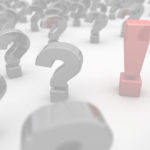 white floor with question marks and an exclamation point