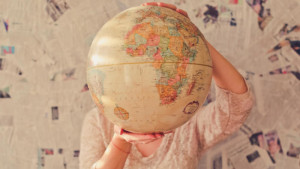 globe map outsourcing international travel slava bowman unsplash 100764526 large 1
