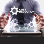 Business person selecting cost reduction