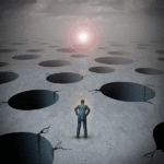 man staring at holes in the ground with light on the horizon
