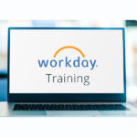 Laptop with Workday training on screen